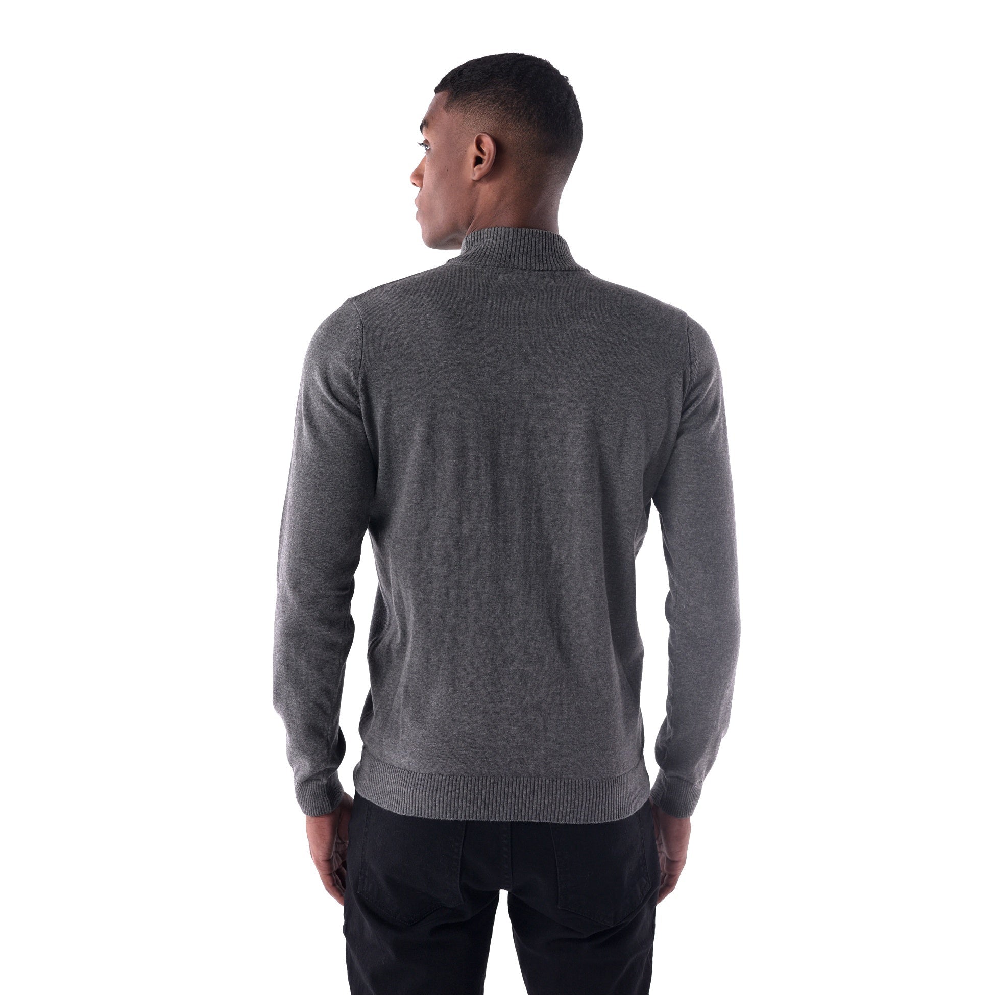 Man wearing a gray sweater from behind on a white background