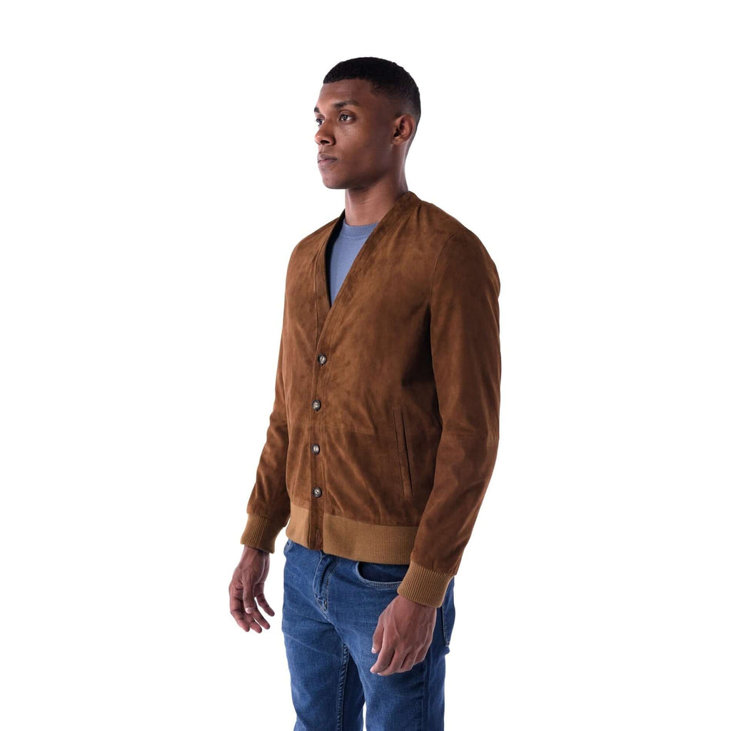Man wearing a brown suede jacket on a white background