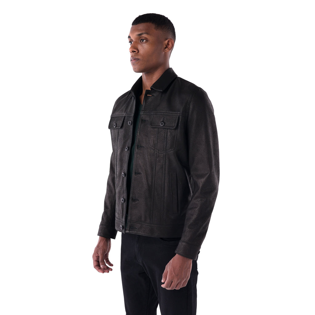 Man wearing a dark leather jacket on a white background