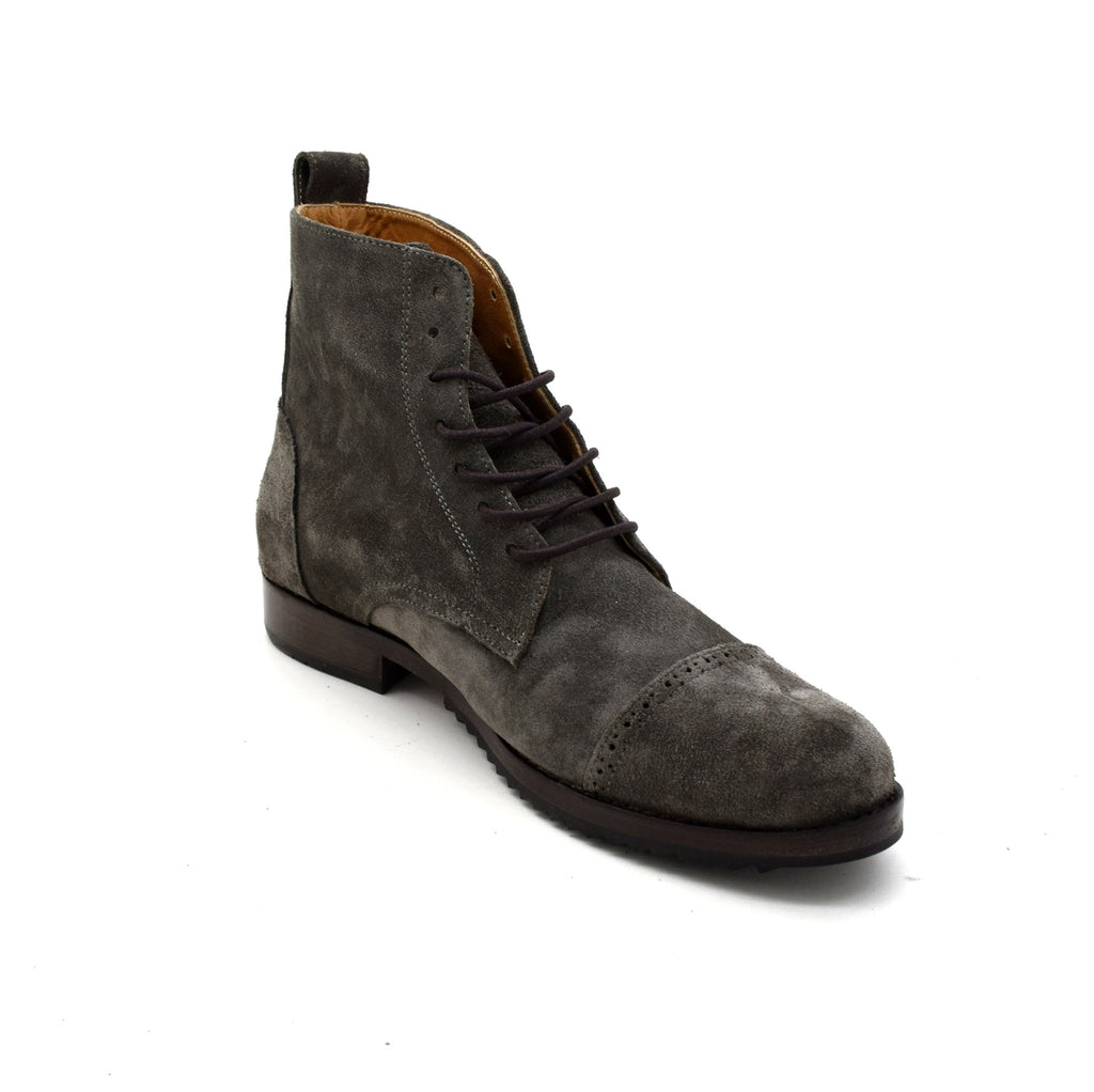 Gray suede boot on a white background