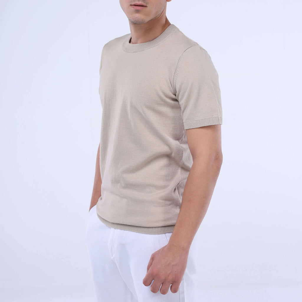 Model wearing the CloudKnit Crew Tee in beige, showcasing its ultra-soft fabric and stylish design.