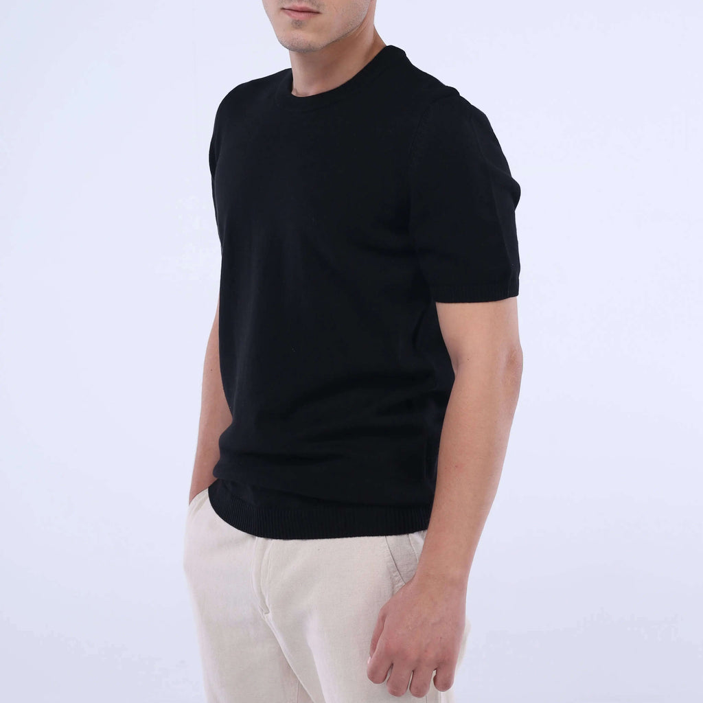 Model wearing the CloudKnit Crew Tee in black, showcasing ultra-soft Egyptian cotton and sleek design.