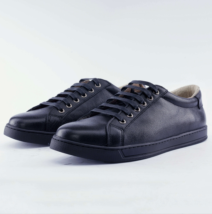 Black leather Low-Top Sneakers on white background
