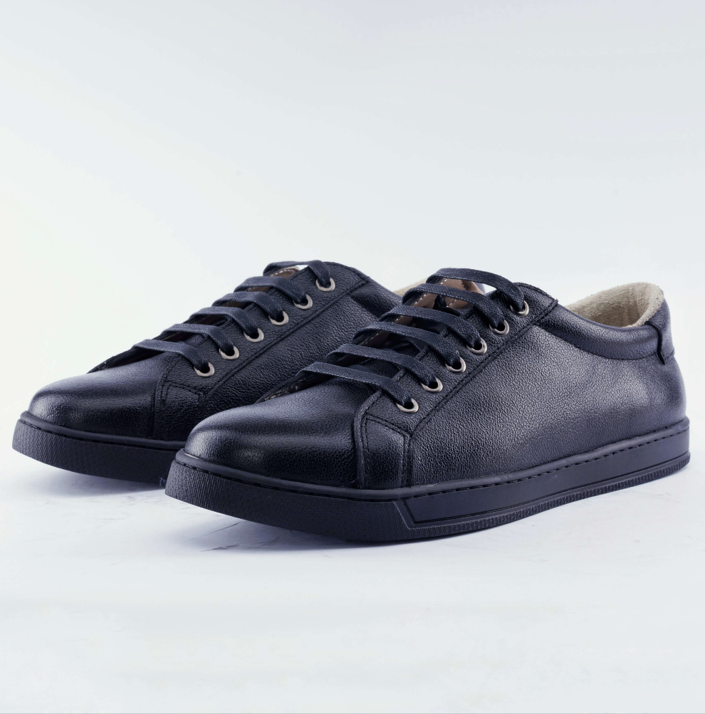 Black leather Low-Top Sneakers on white background