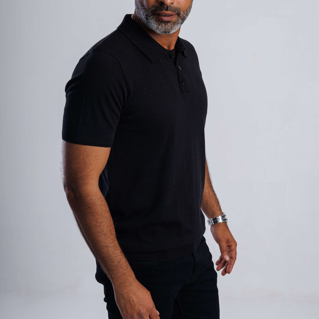 ComfortLite™ Knit Polo in black, showcasing a man styled for comfort and versatility, ideal for all-season wear.