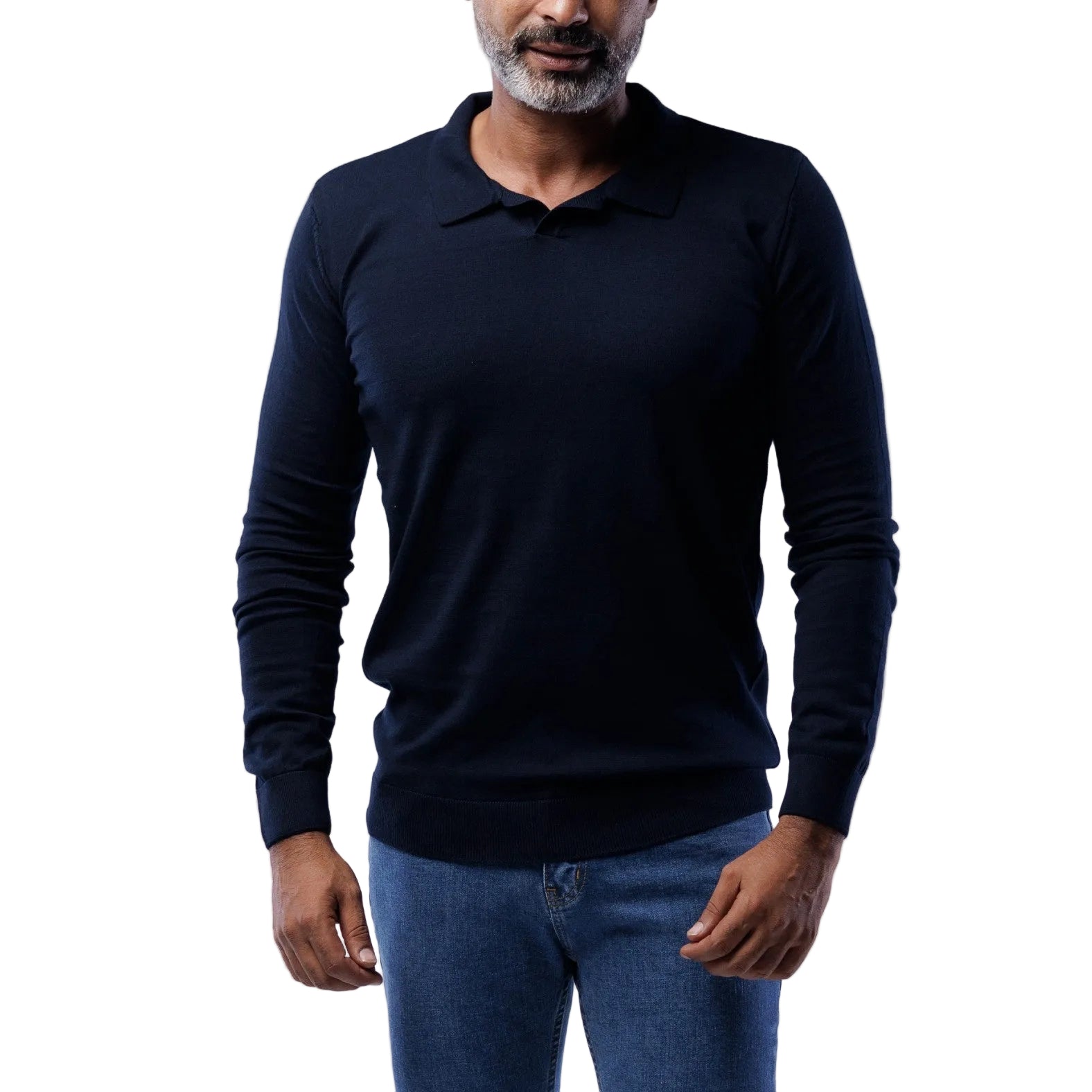 Man wearing a black long-sleeve shirt and blue jeans on a light gray background