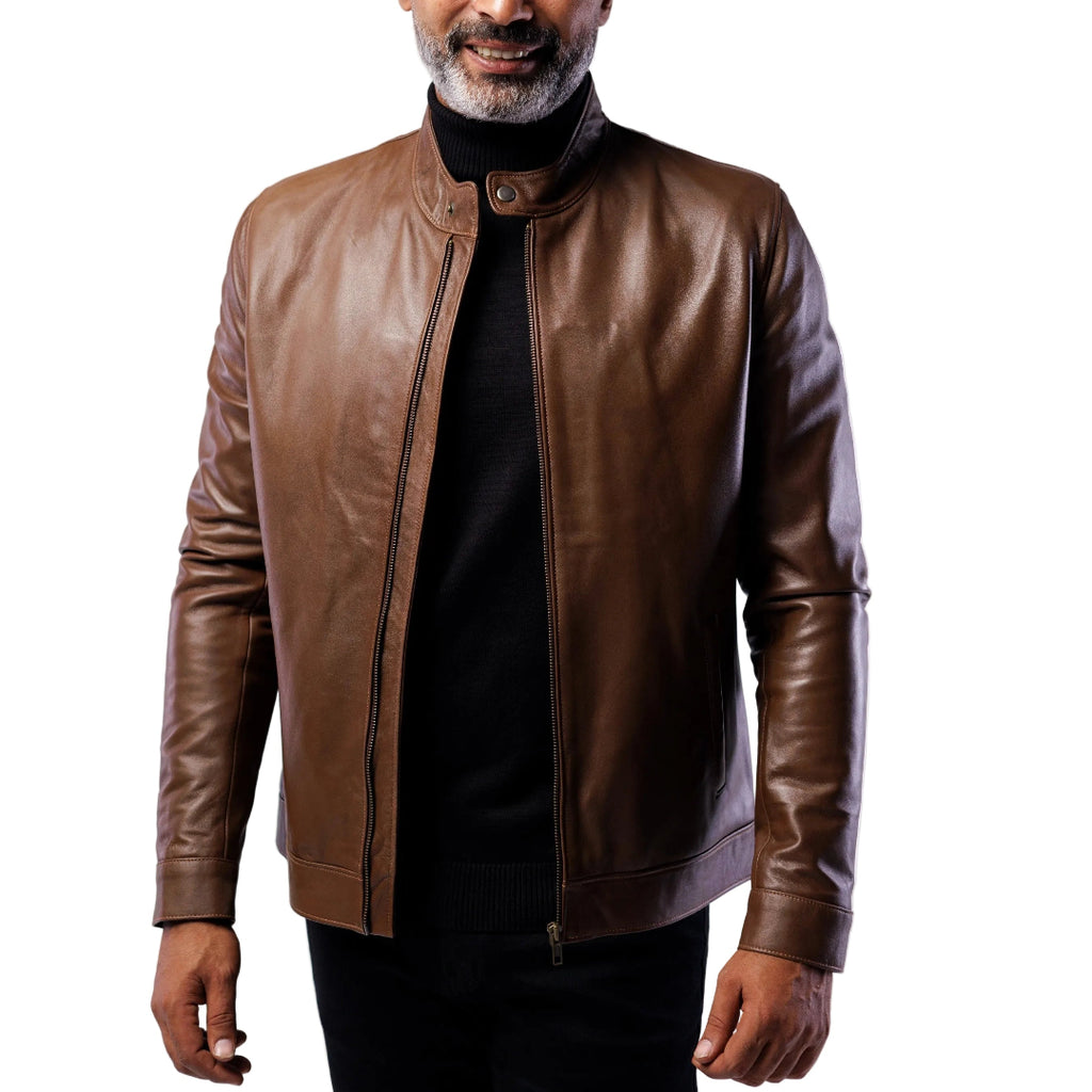 Man wearing a brown leather jacket on a white background