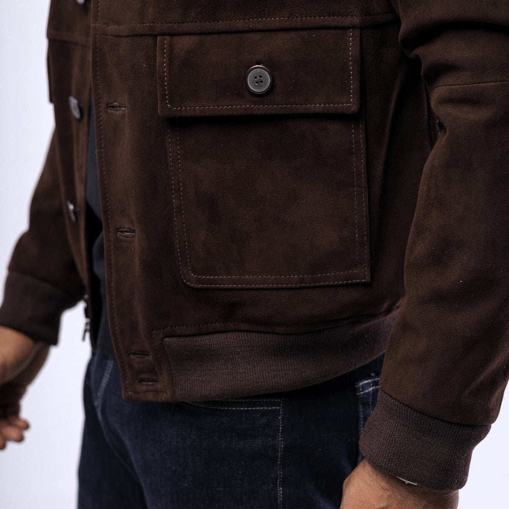 Brown jacket with a pocket on a white background