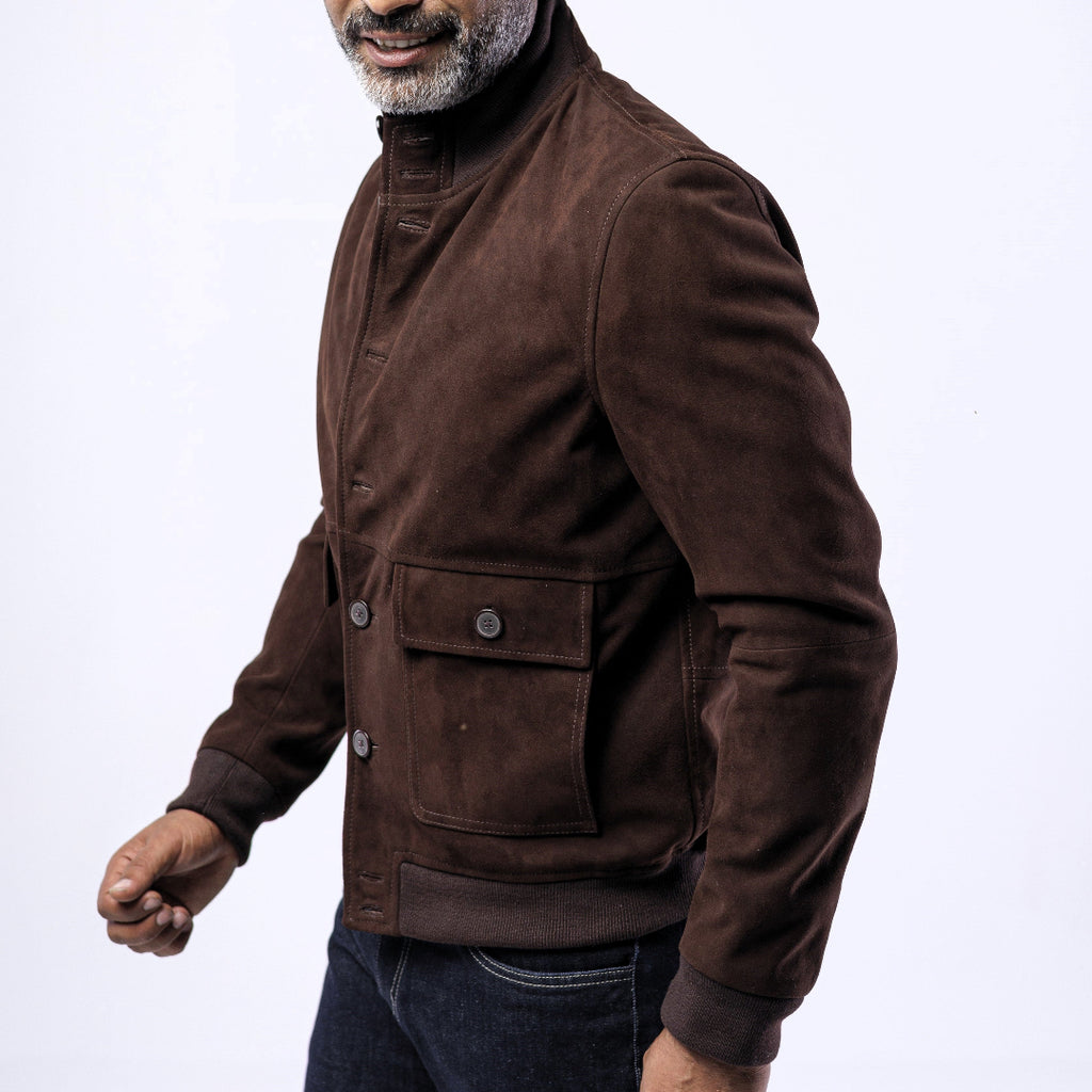 Man wearing a brown jacket on a white background