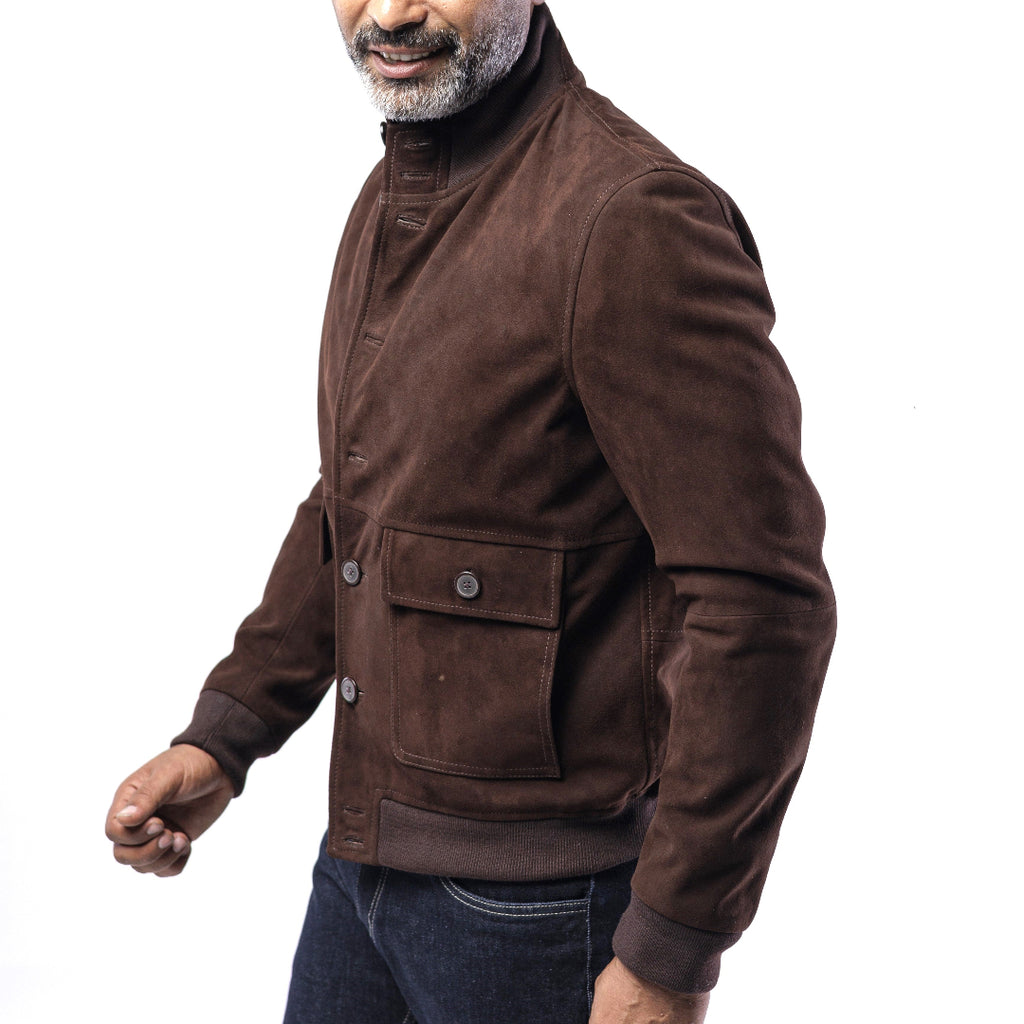 Man wearing a brown jacket on a white background