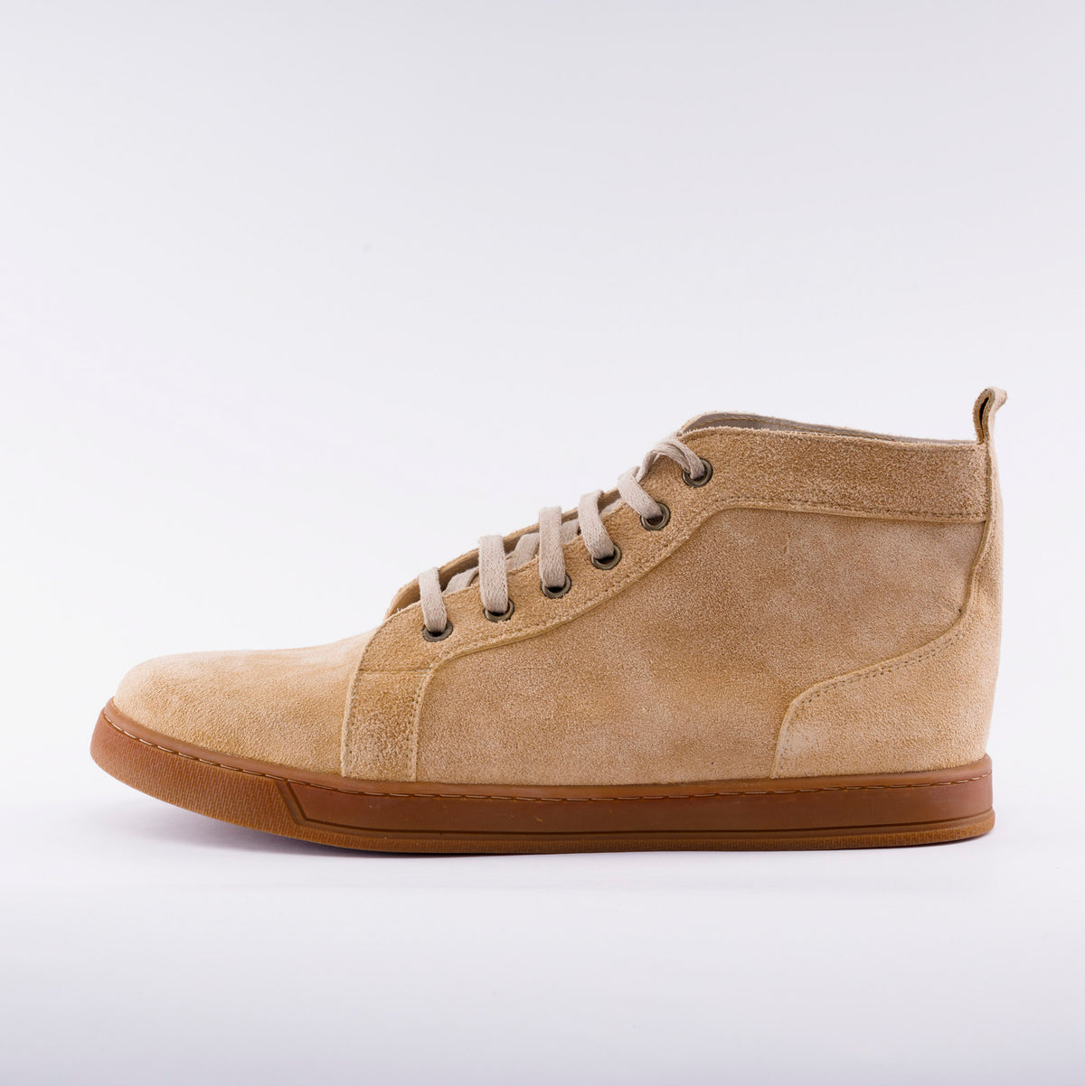 A beige suede high-top sneaker boot with matching laces and a brown gum sole, shown in profile against a clean white background.