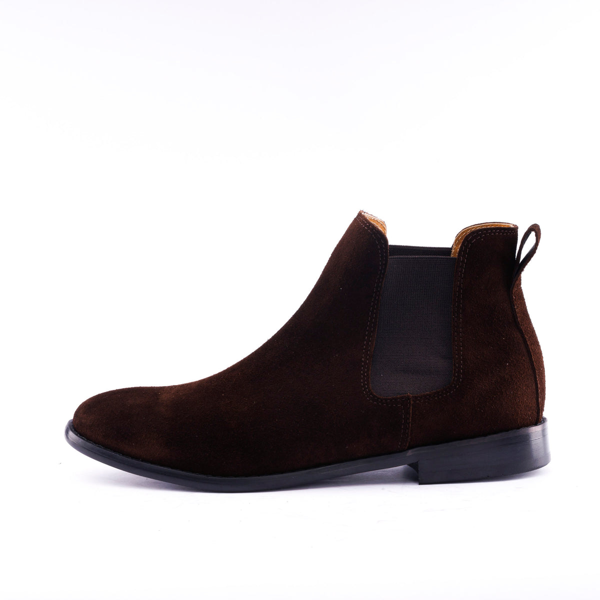 A dark brown suede Chelsea boot with a black elastic side panel and a low black heel, shown in profile against a white background.