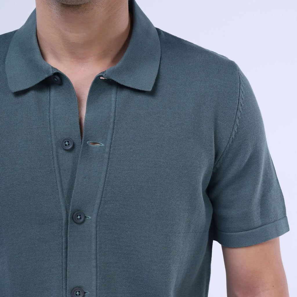 Knit-Layer™ Short Sleeve Shirt in dark green with buttons and a collar, made from lightweight cotton.
