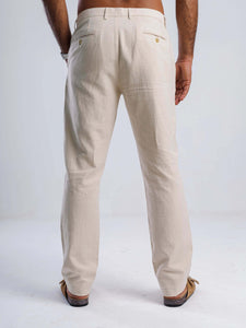 Men's linen blend tapered trousers showcasing a tailored fit and discreet back welt pockets.