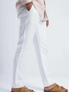 Linen blend tapered trousers in white, featuring a tailored fit and discreet side pockets.