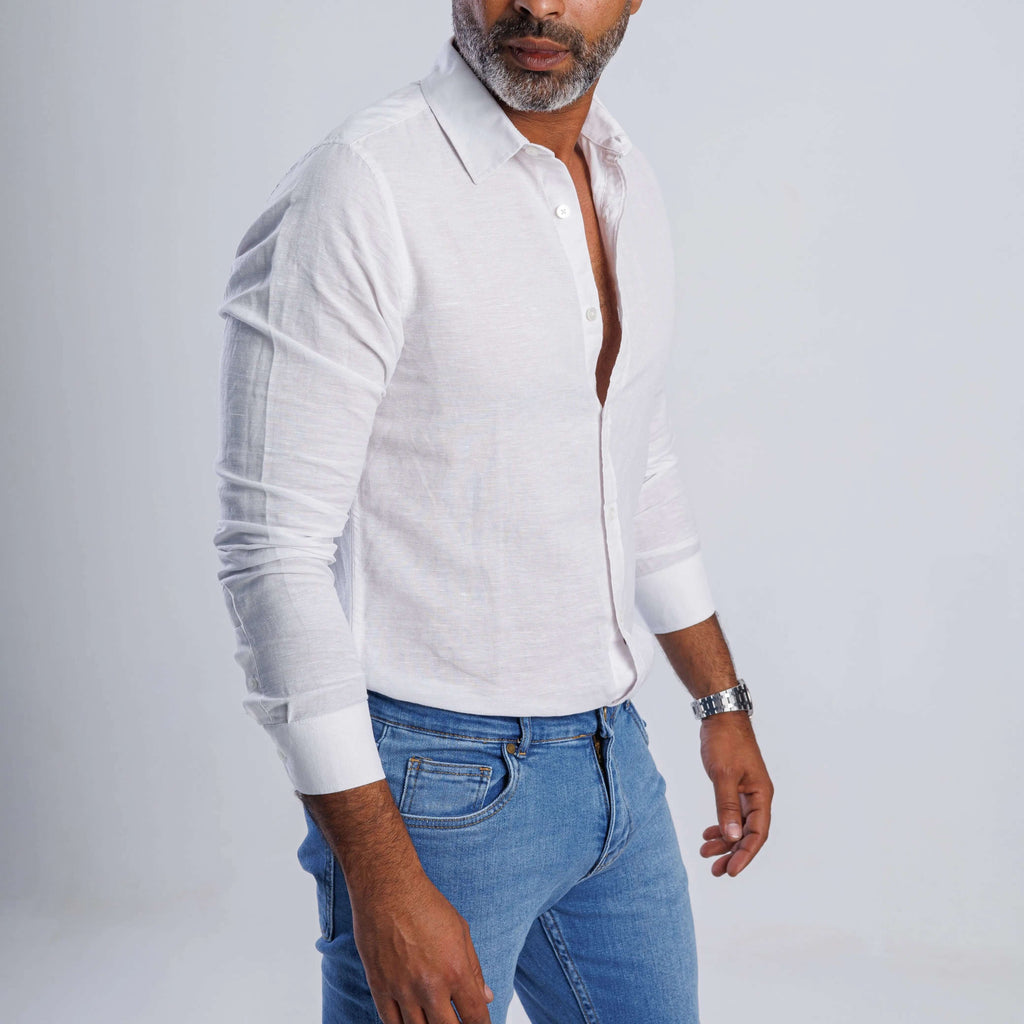 Linen blend slim-fit shirt in white worn with jeans, showcasing breathable comfort and elegant style.