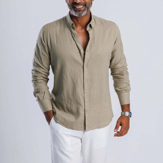 Relaxed linen-blend shirt in beige on a male model, showcasing breathable fabric and classic button details.