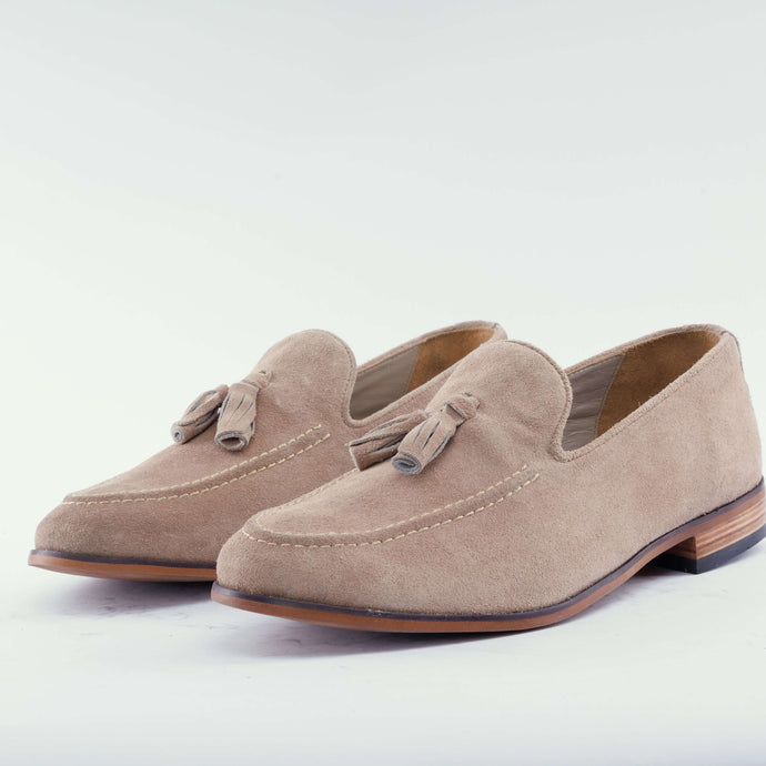 Luxe calf suede tassel loafers in olive green, showcasing handcrafted elegance for modern gentlemen.