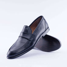 Load image into Gallery viewer, Black leather loafer shoe on a white background
